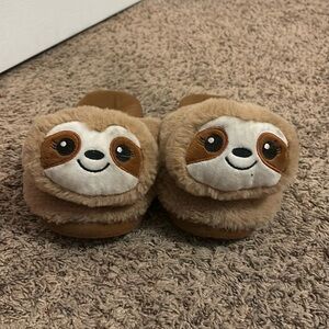 Slippers, a little worn in on the heels